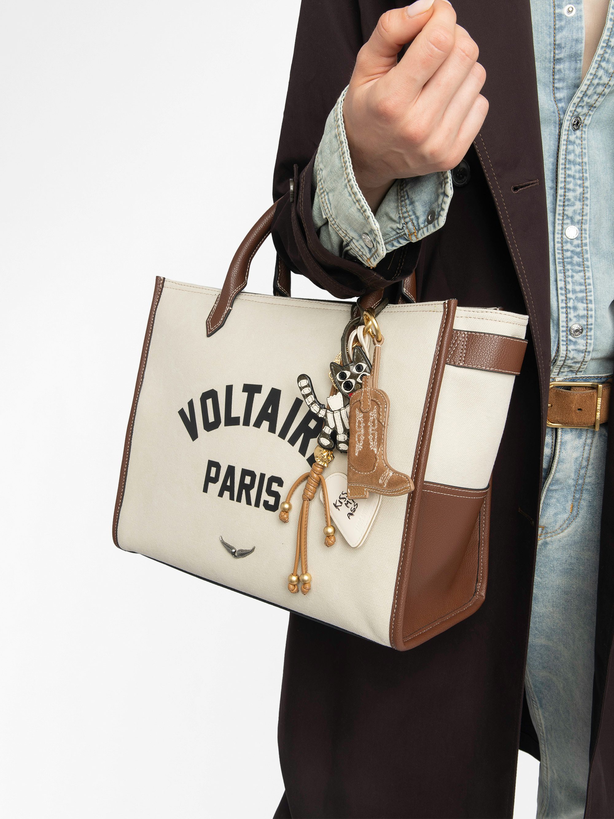 Porte-Clés Tex - Porte-clés Tex en forme de santiag en suède, à accrocher à un sac ou à des clés.